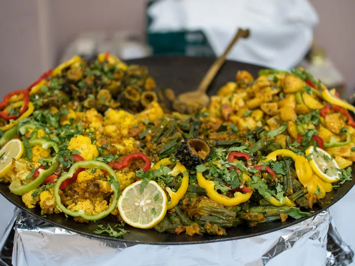 Platter of mixed roasted vegetables with lemon and coriander